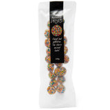 Packaged aniseed gummy candies with colorful sprinkles on a transparent background.