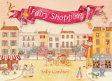 Book cover of 'Fairy Shopping' by Sally Gardner with a fairy-tale town scene and pink banner.