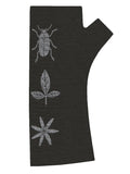 A black merino fingerless glove featuring a flax seed pod design in cream ink.