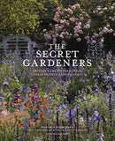 Book cover of 'The Secret Gardeners' with a garden scene and flowers.