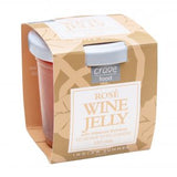 Packaging of Rose Wine Jelly 120mls with the brand name 'Crave Food' visible on the top. The packaging is predominantly beige with a clear window displaying the red-colored jelly inside.